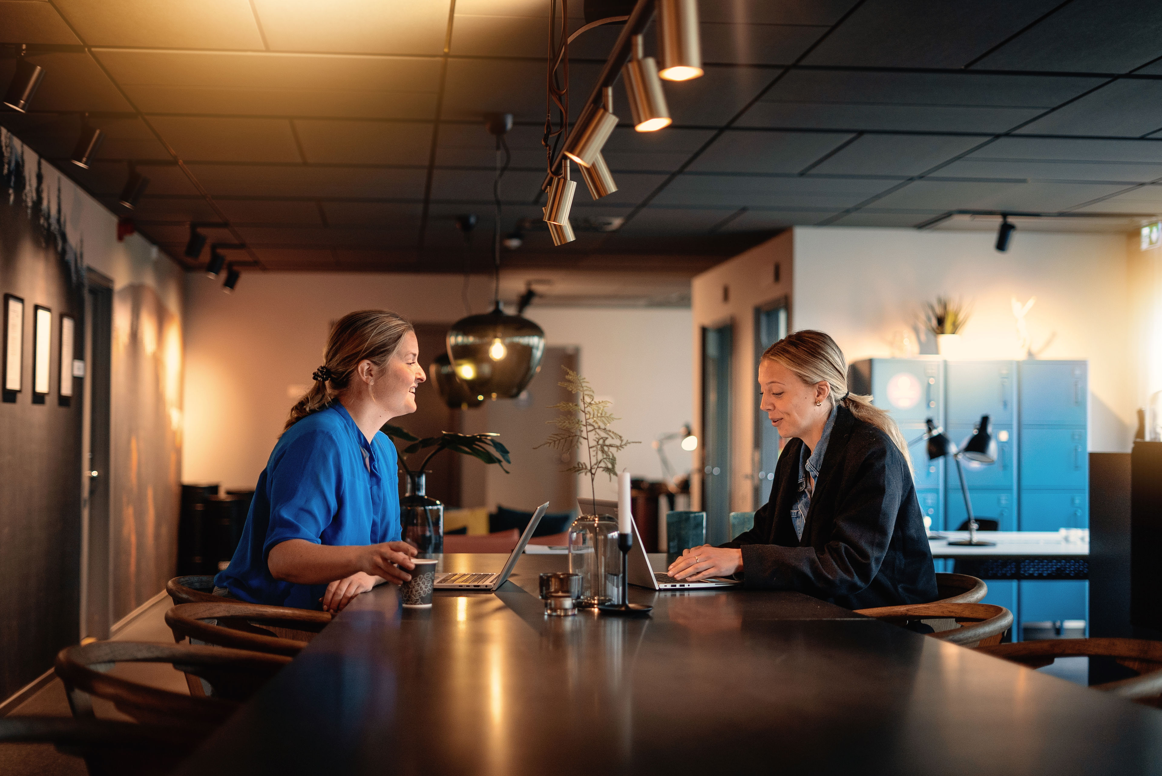 Two Stena Recycling employees conversing.