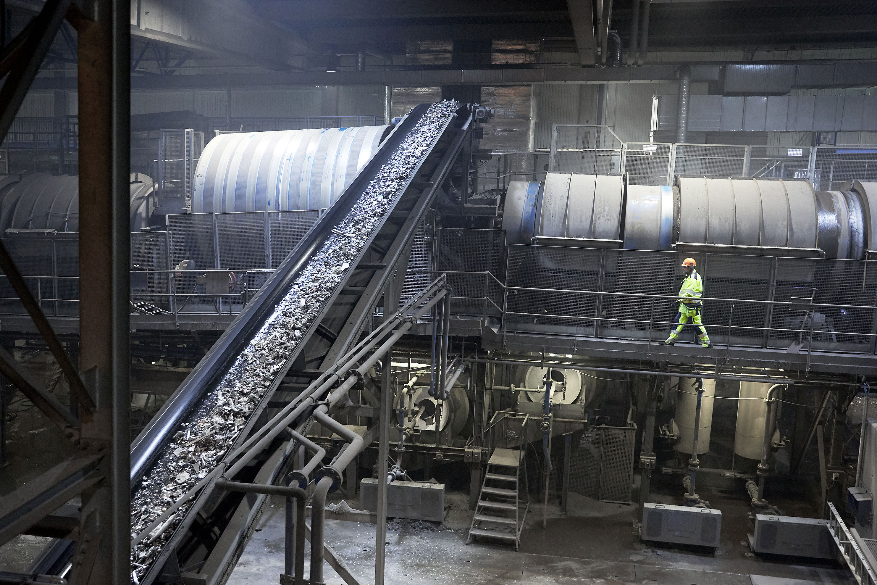 A Stena Recycling employee in protective clothing works in Stena Nordic Recycling Center.