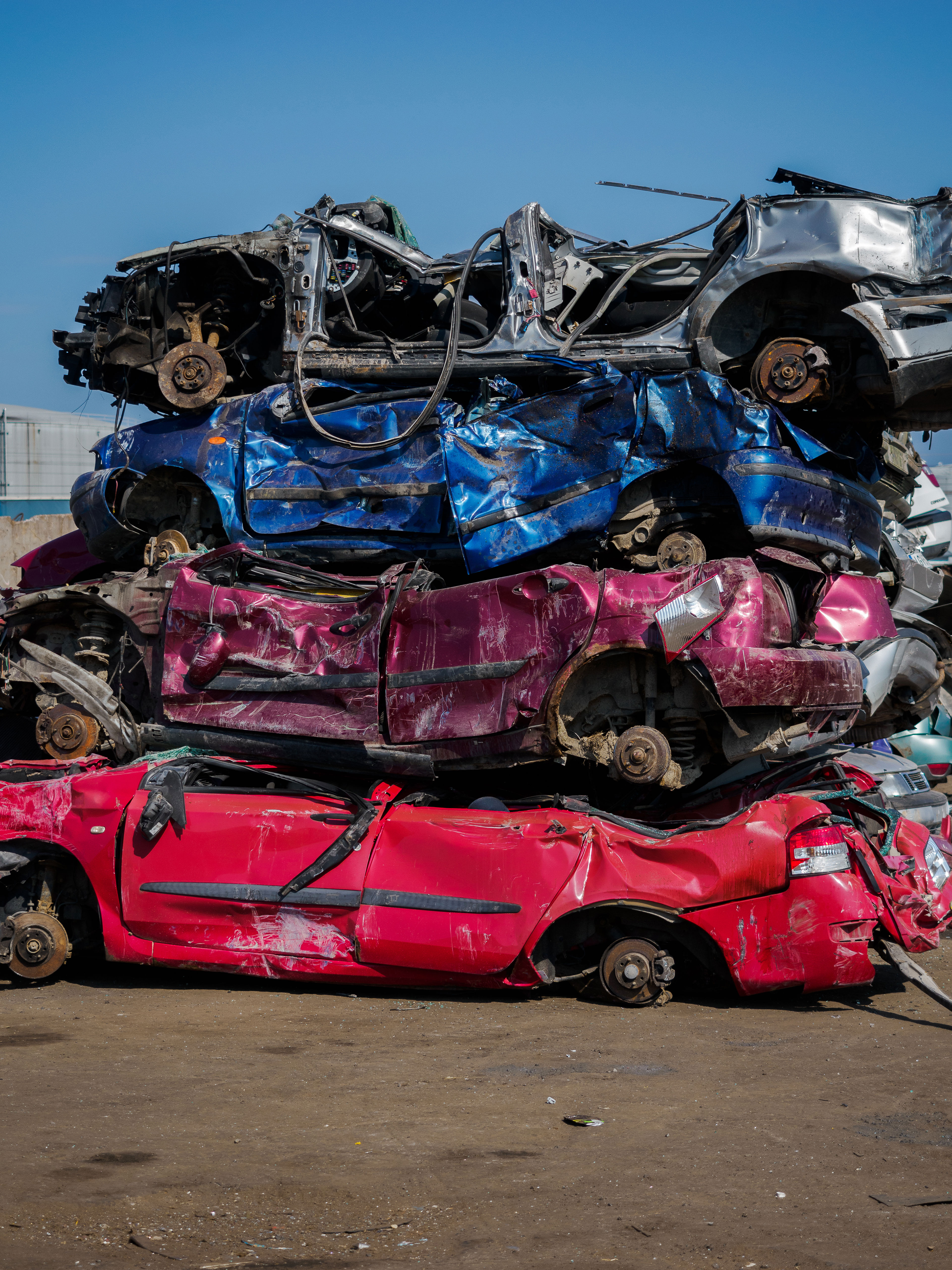 Close-up of a pile of compressed car bodies
